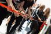 Ribbon being cut on new store